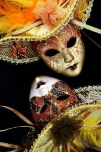 Vintage carnival masks on black background